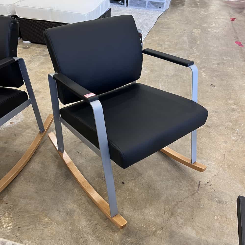 black vinyl rocking chair with maple rockers and silver legs