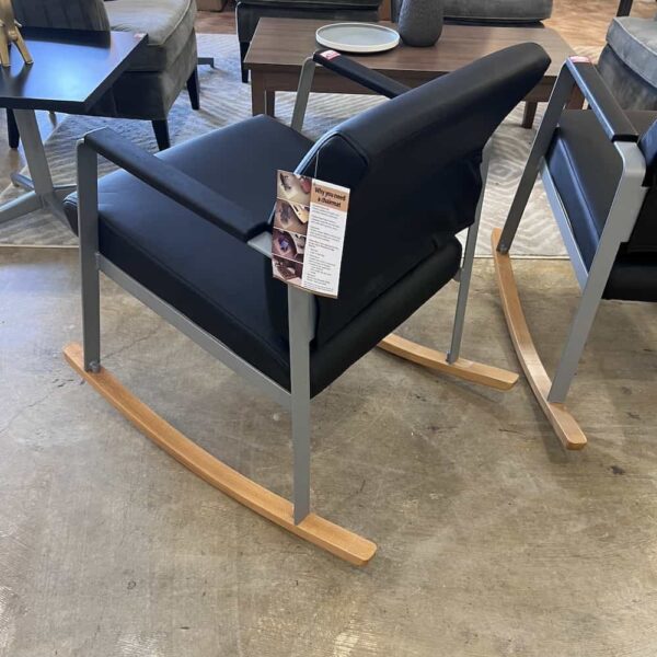 black vinyl rocking chair with maple rockers and silver legs