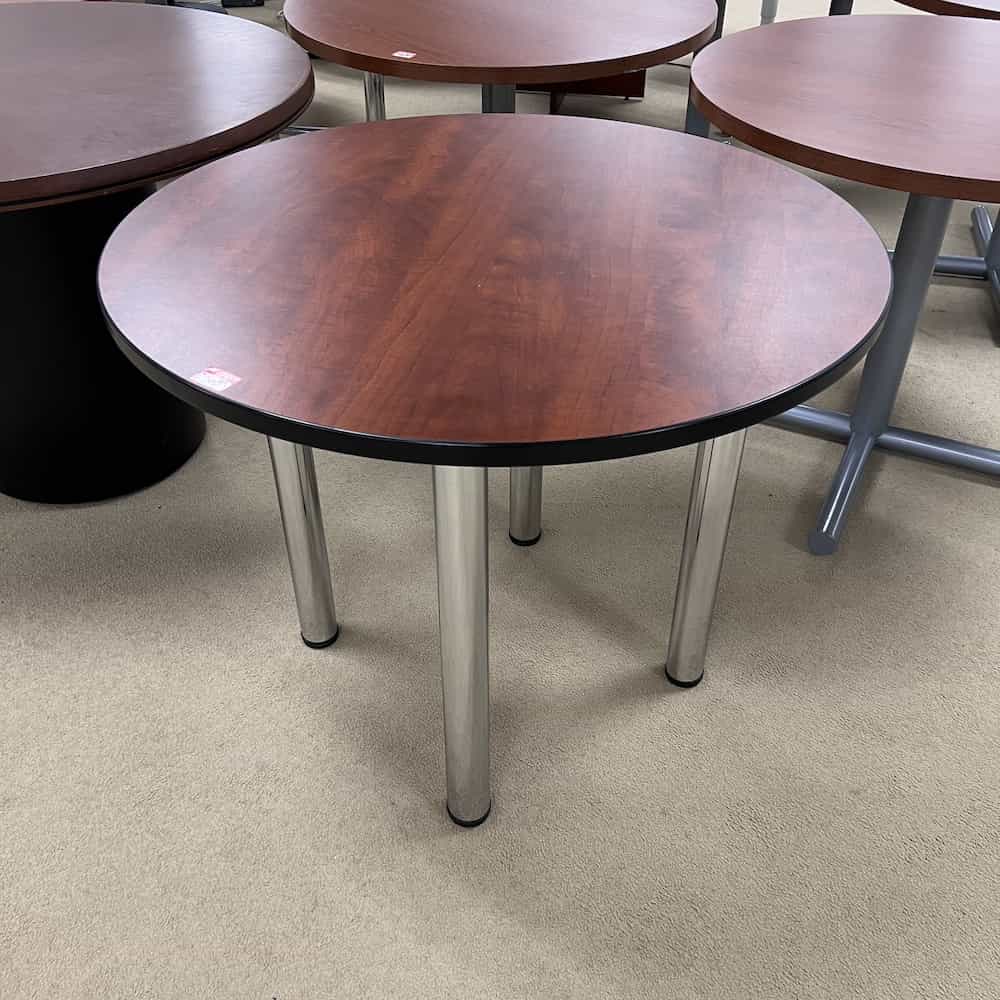cherry round table with 4 silver legs