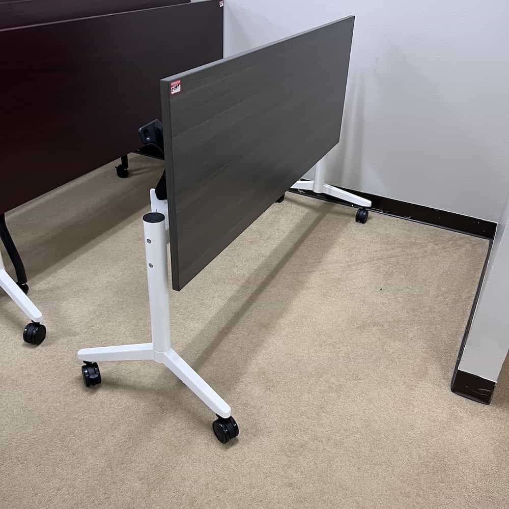 grey laminate top with white metal base, flipped