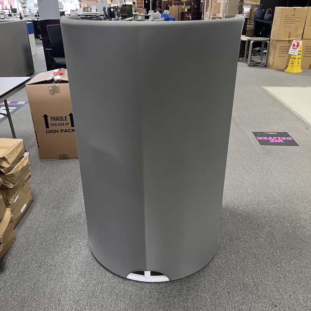 grey fabric sides, maple laminate desk area, there is a metal white frame underneath, rounded high sides, horseshoe shape, front view