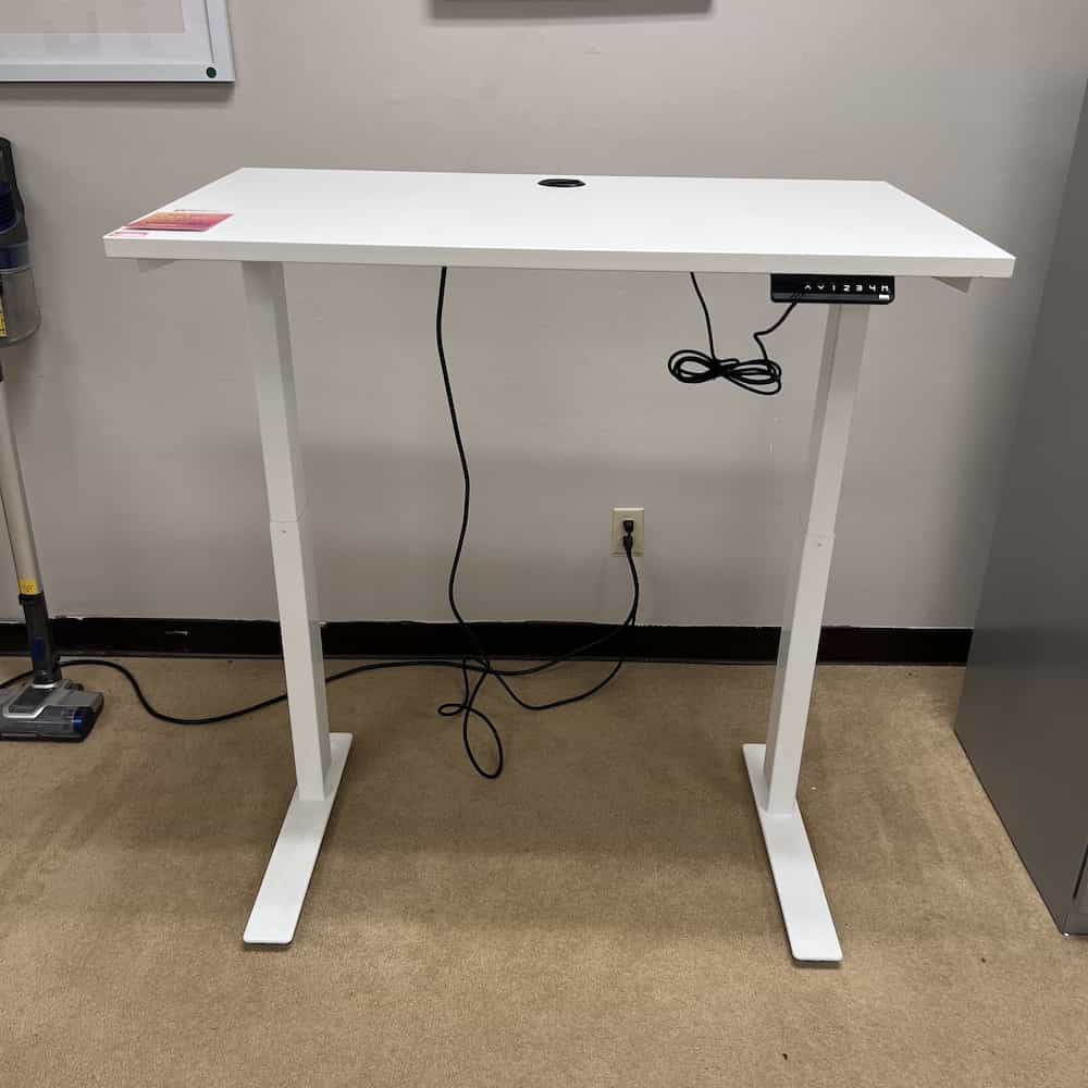 white laminate top height adjustable desk with white base, clear design
