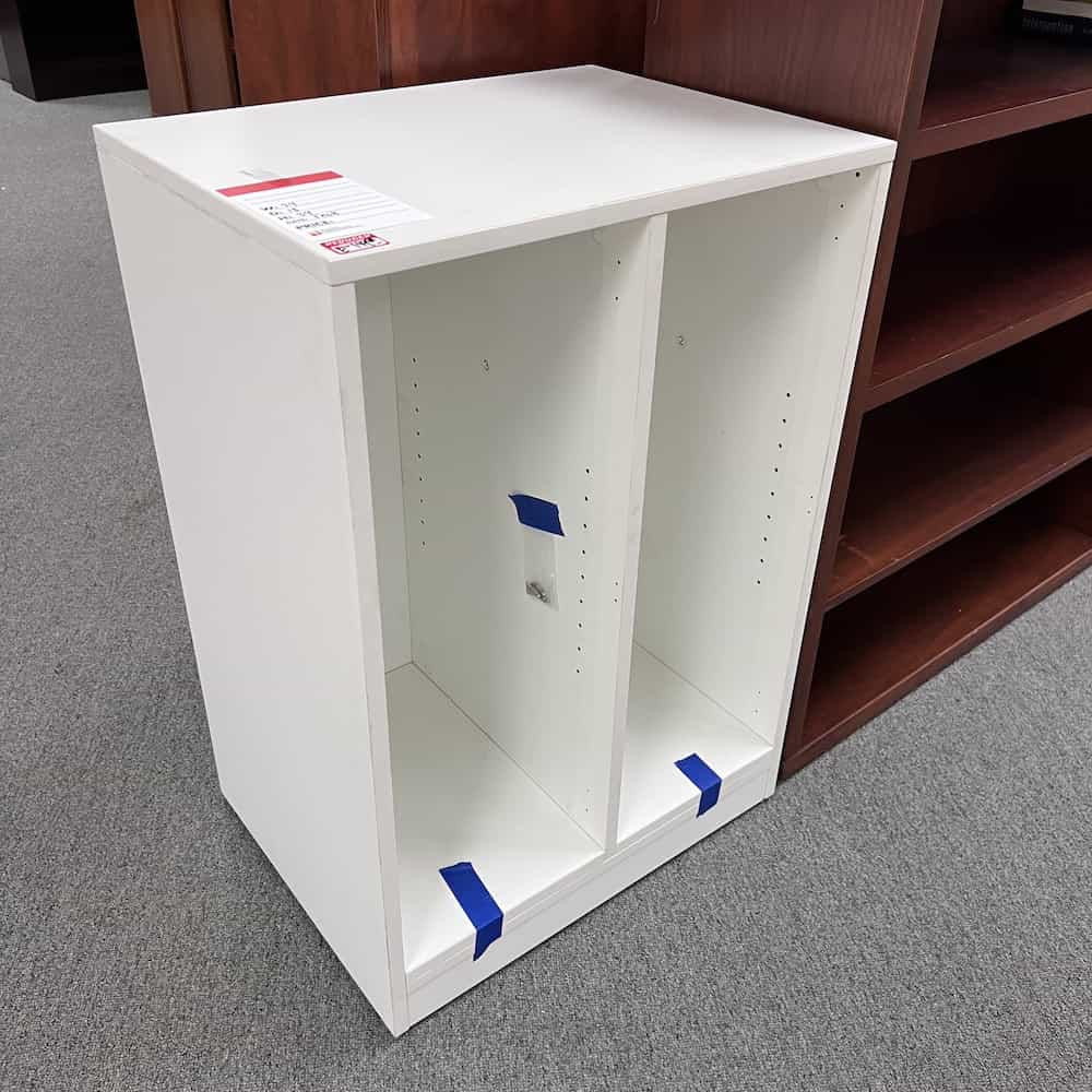 white storage cabinet with split down the center, and shelves