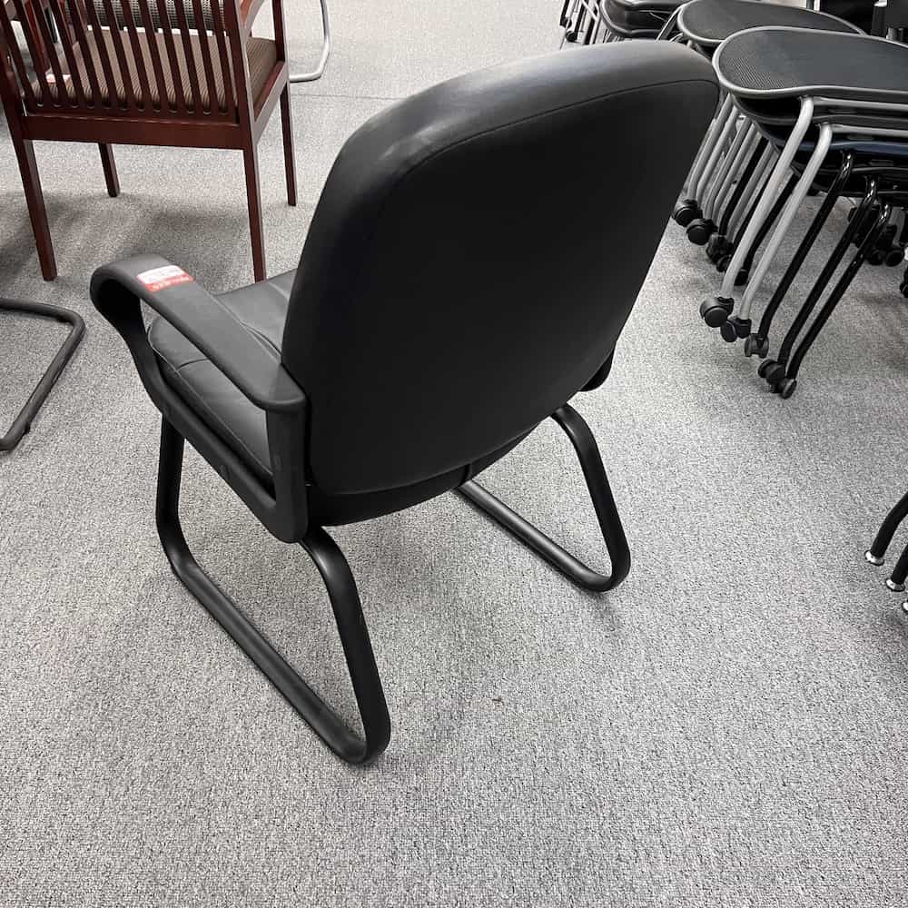 global guest sled chair vinyl cushion black