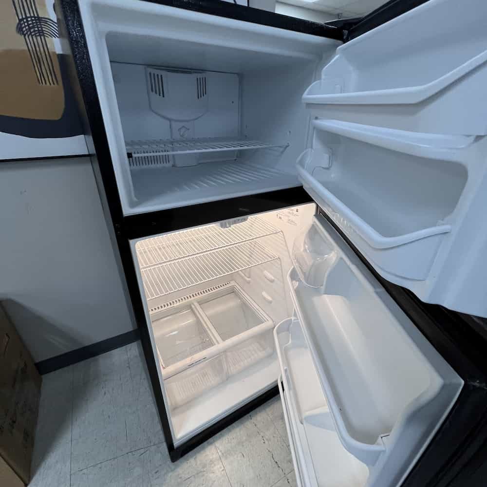 black kenmore refrigerator with freezer top, inside
