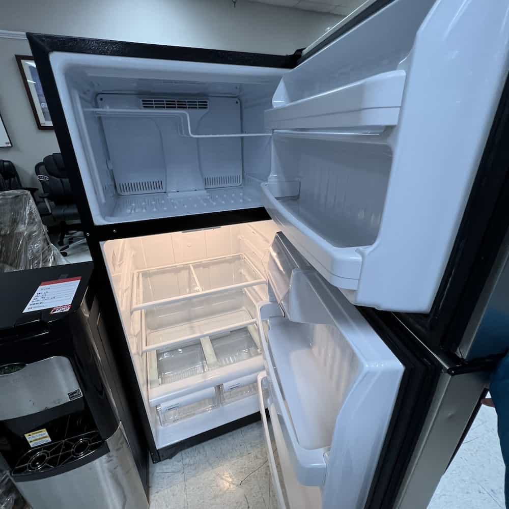 stainless steel refrigerator with freezer top, inside
