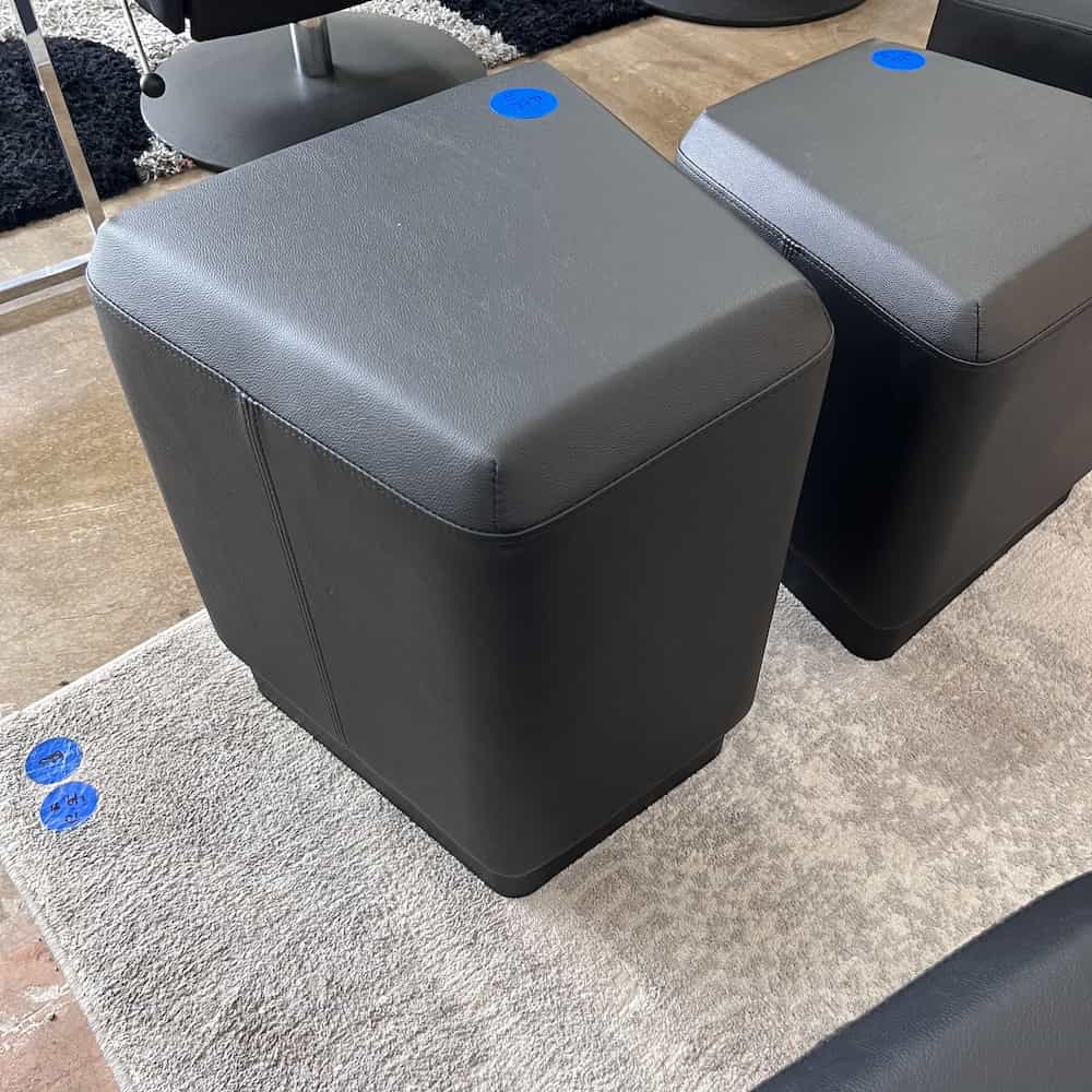 black vinyl ottoman trapezoid