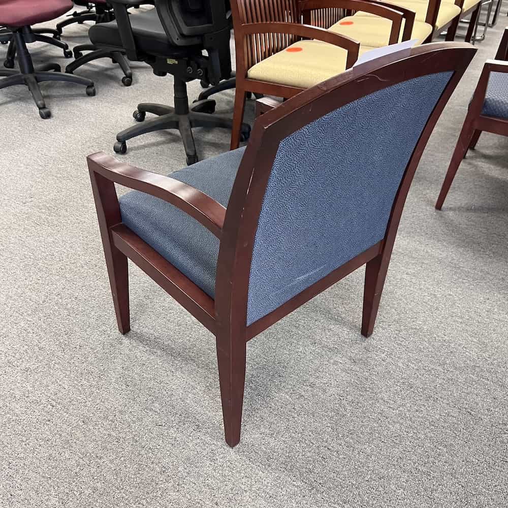 blue upholstery with mahogany arms and base guest chair