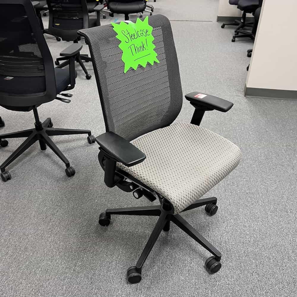 grey green seat upholstered with mesh back steelcase think