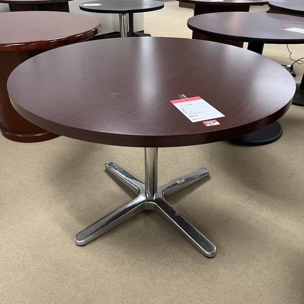 mahogany laminate round table with silver legs kimball international furniture used