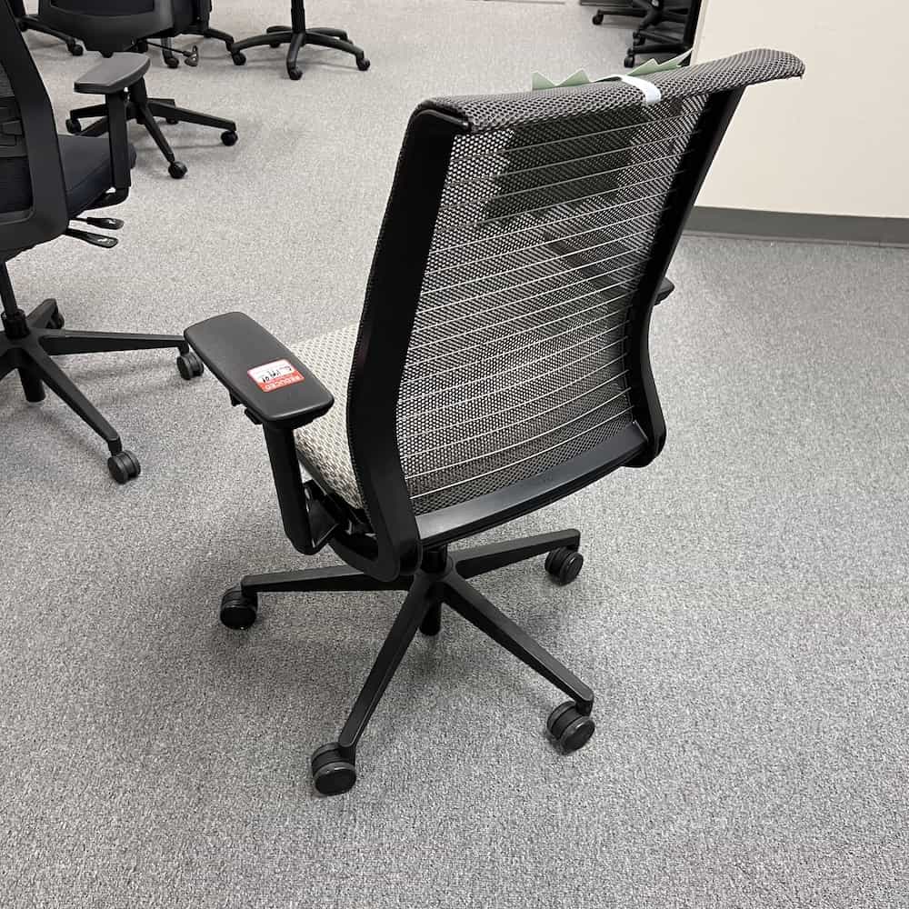 grey green seat upholstered with mesh back steelcase think