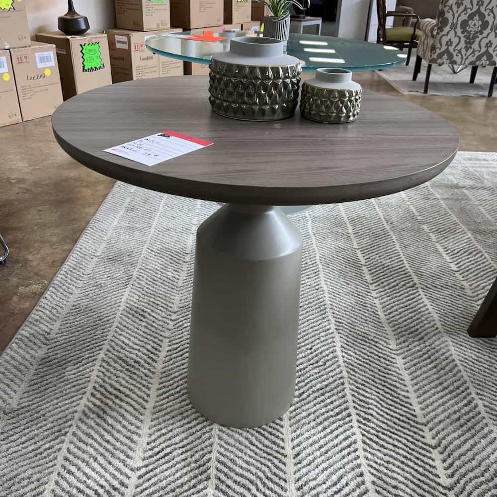 walnut laminate and taupe round table with pedestal base contemporary