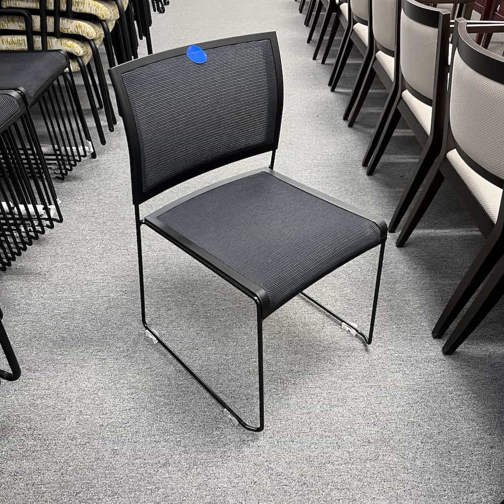 black mesh back and mesh seat stacking chair open box