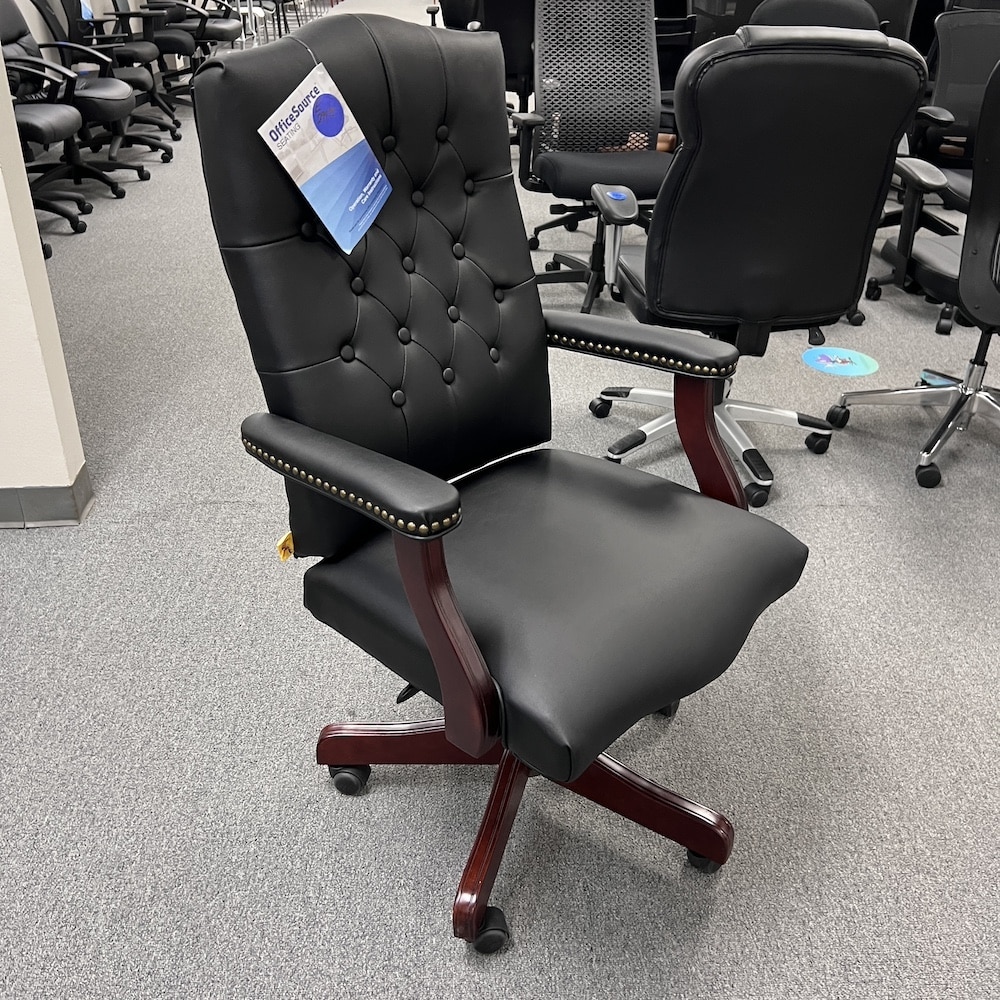 black vinyl executive plush chair with high back and mahogany base and arms