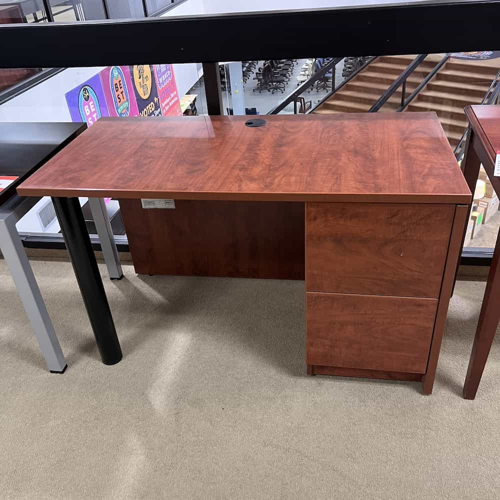 cherry 48 x 24 laminate desk with file/file on right side, black pole on left side