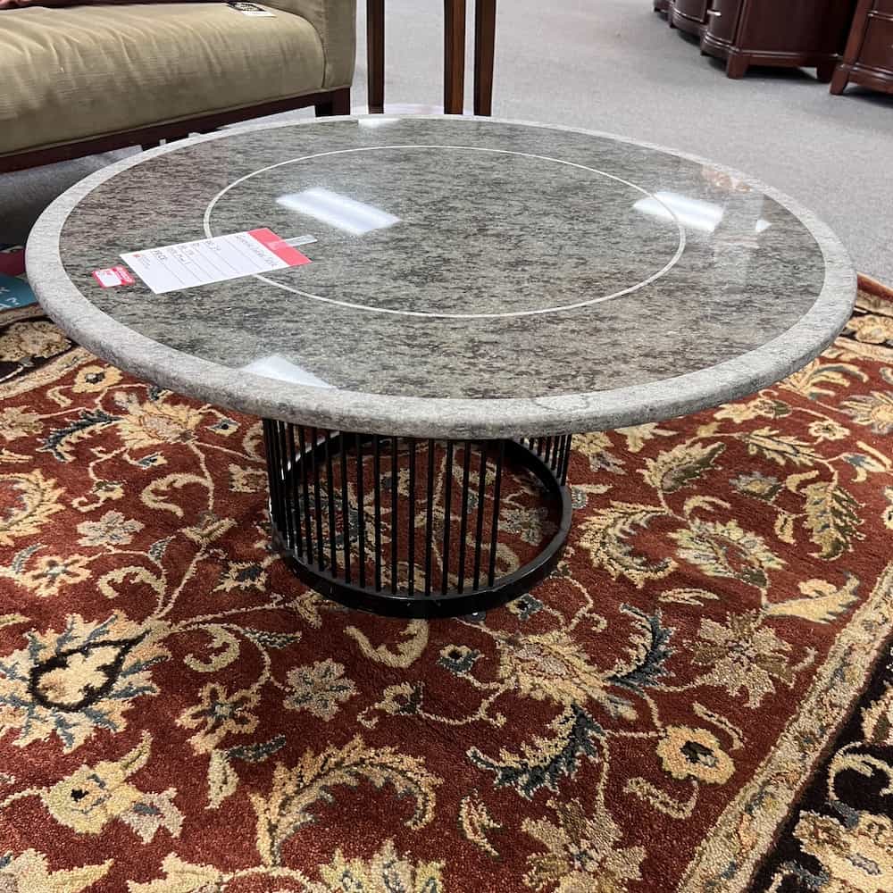 green granite round top conference table with black metal round slate base