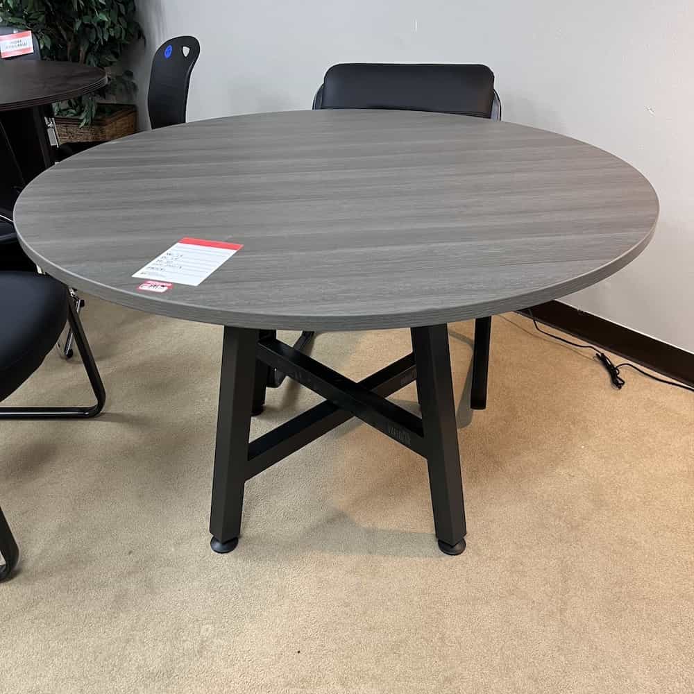 open box laminate round grey top with black base varidesk brand metal