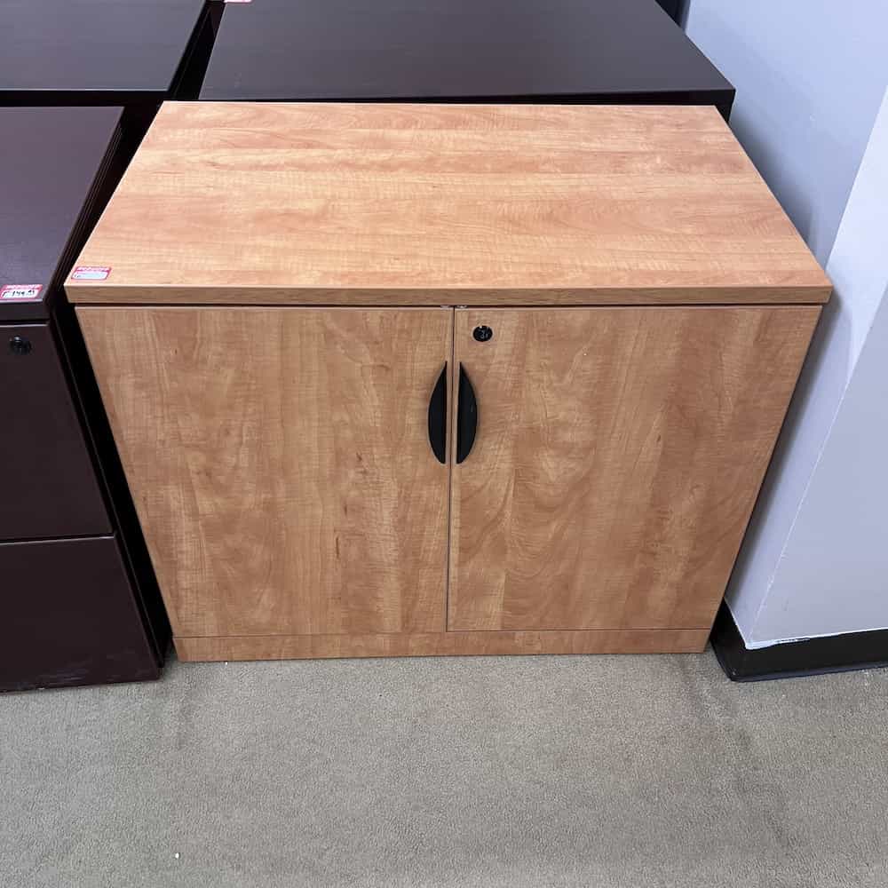 honey laminate 2 door storage cabinet 29" High