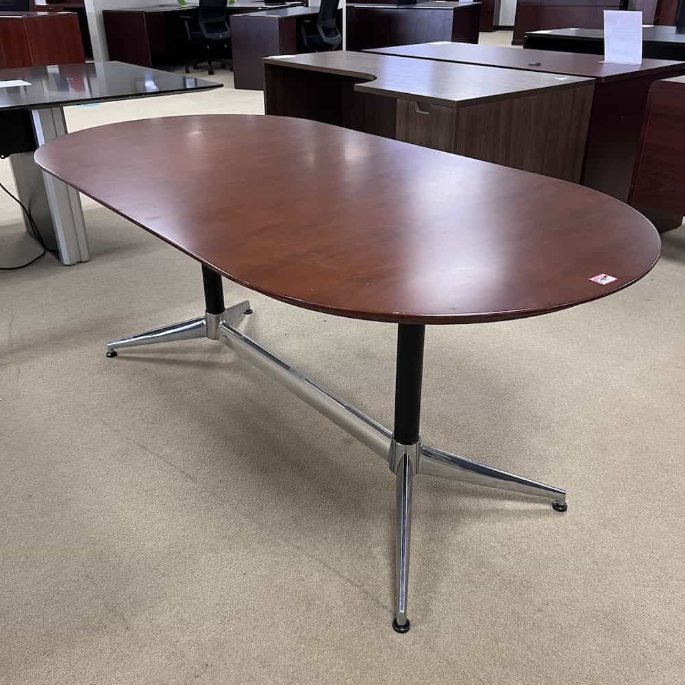 mahogany veneer racetrack conference table with silver/black base
