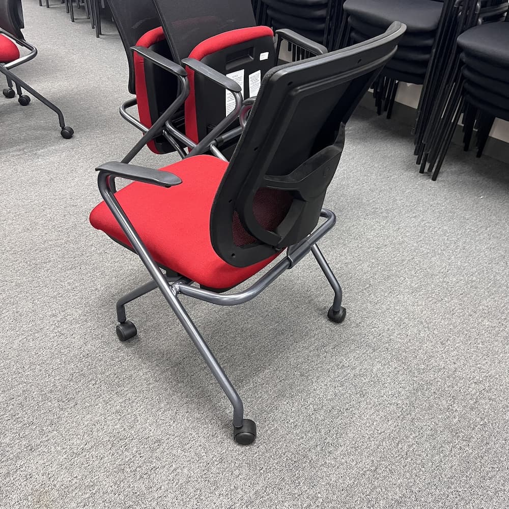 red upholstered seat nesting chair with black mesh back seat, nesting, rolling conference training chair, used office furniture
