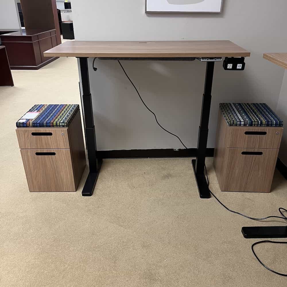 light walnut laminate with black cutout pulls, colorful cushion top, mobile, teknion brand, set up with the height adjustable desk sold separately