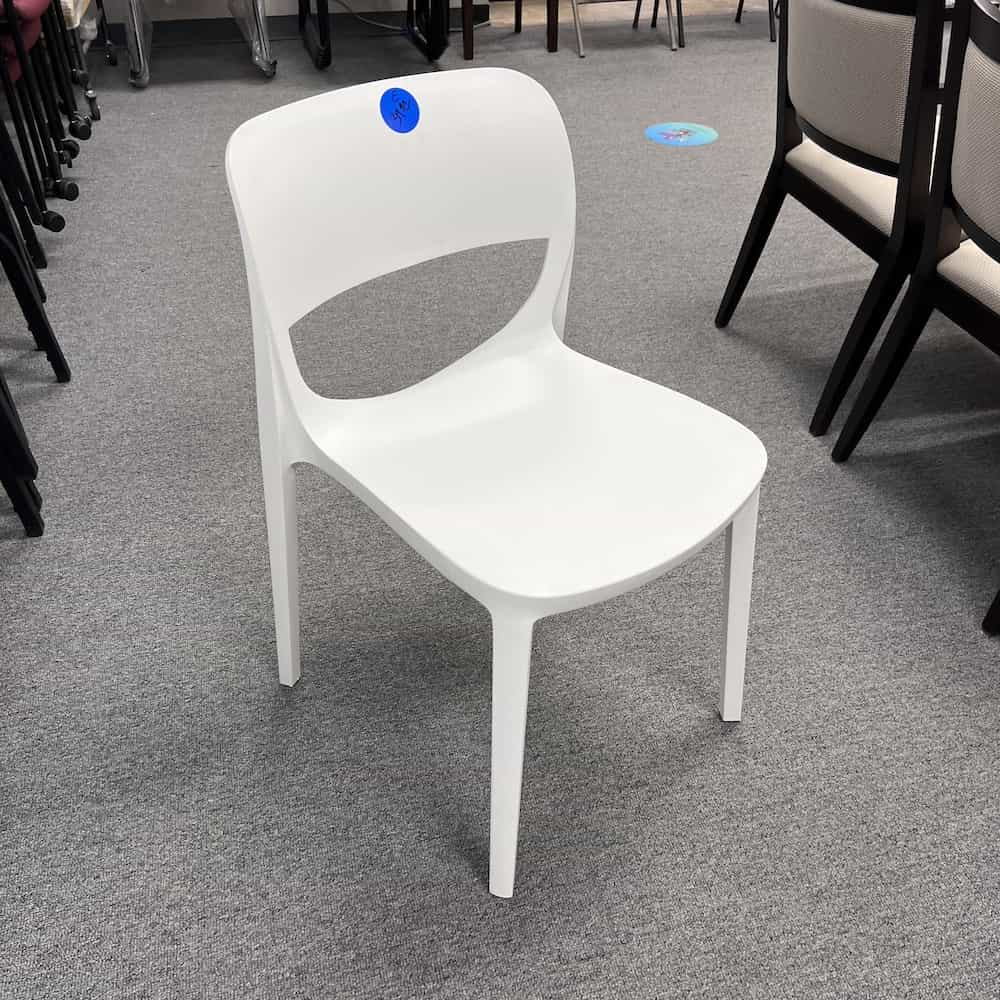 white plastic stacking chairs