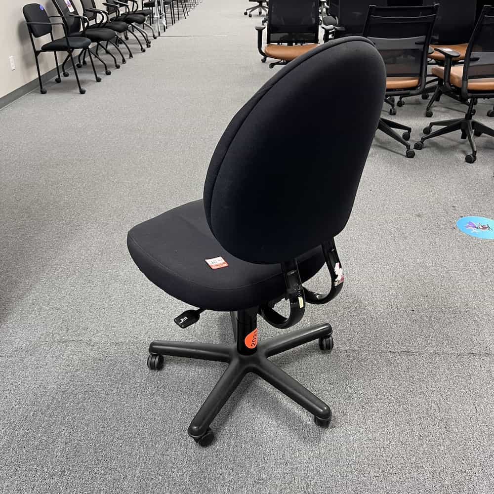 black armless criterion plus office chair used