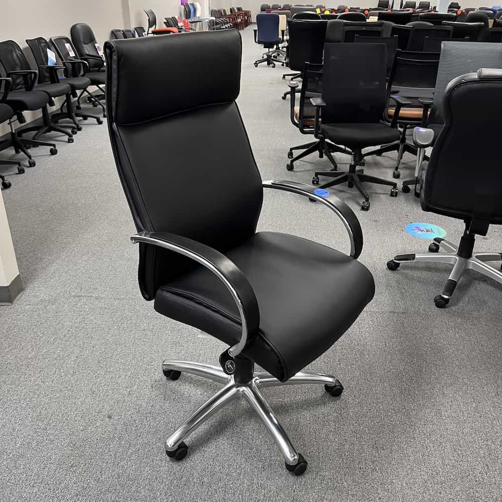 black vinyl modern sleek chair with chrome base accents