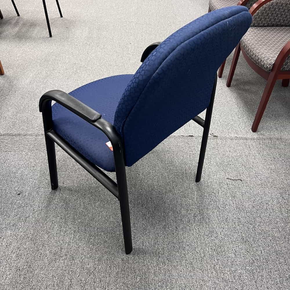 blue upholstered guest chair with black arms lacasse