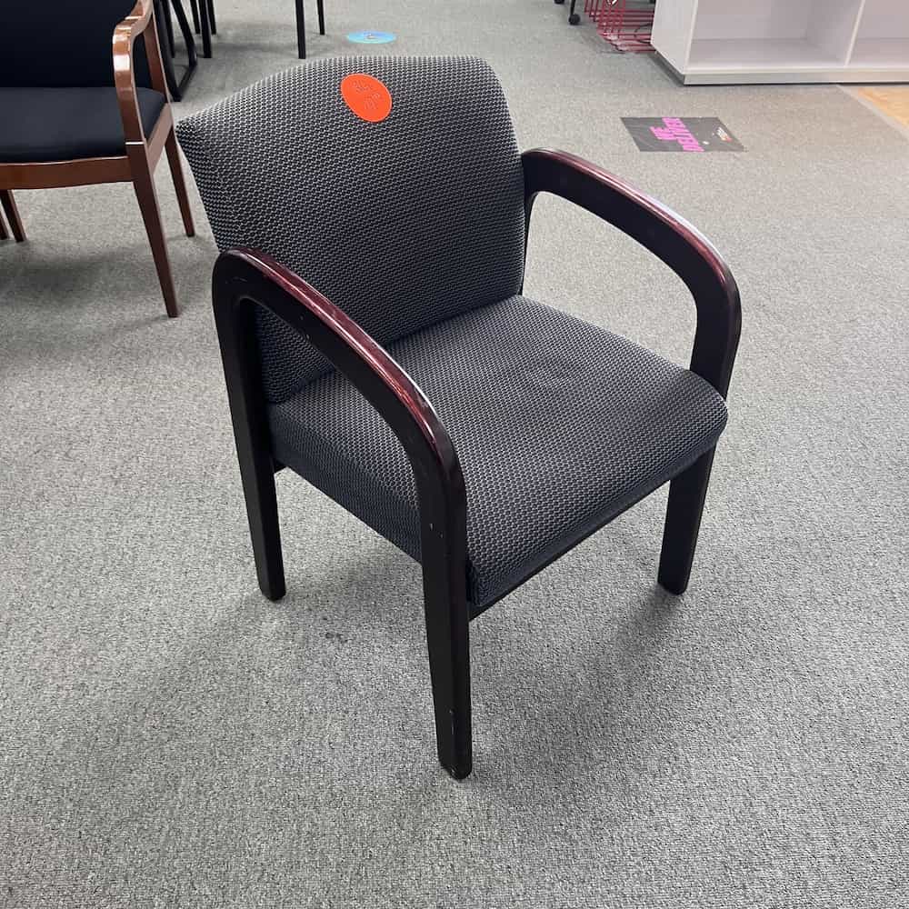 grey and black circles upholstery with mahogany veneer arms and legs guest chair
