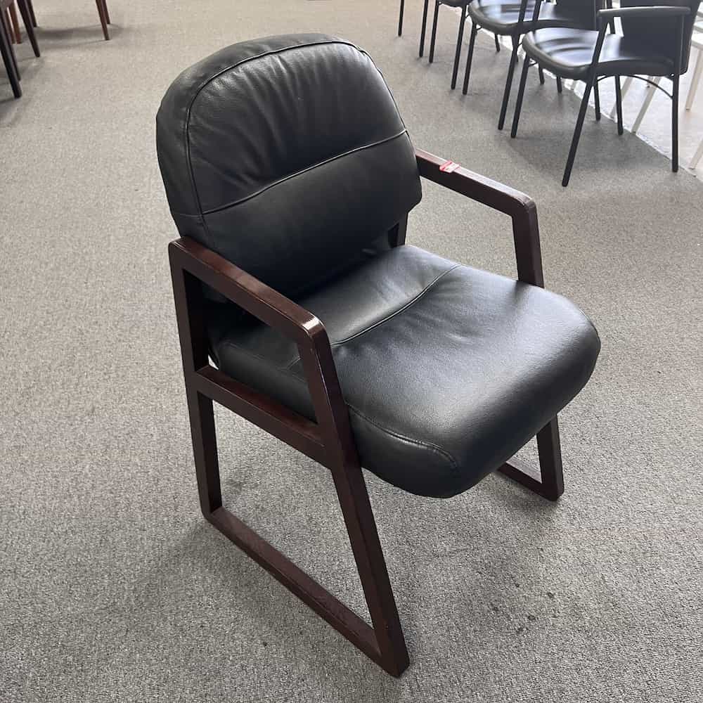 black vinyl plush guest chair hon with mahogany arms veneer