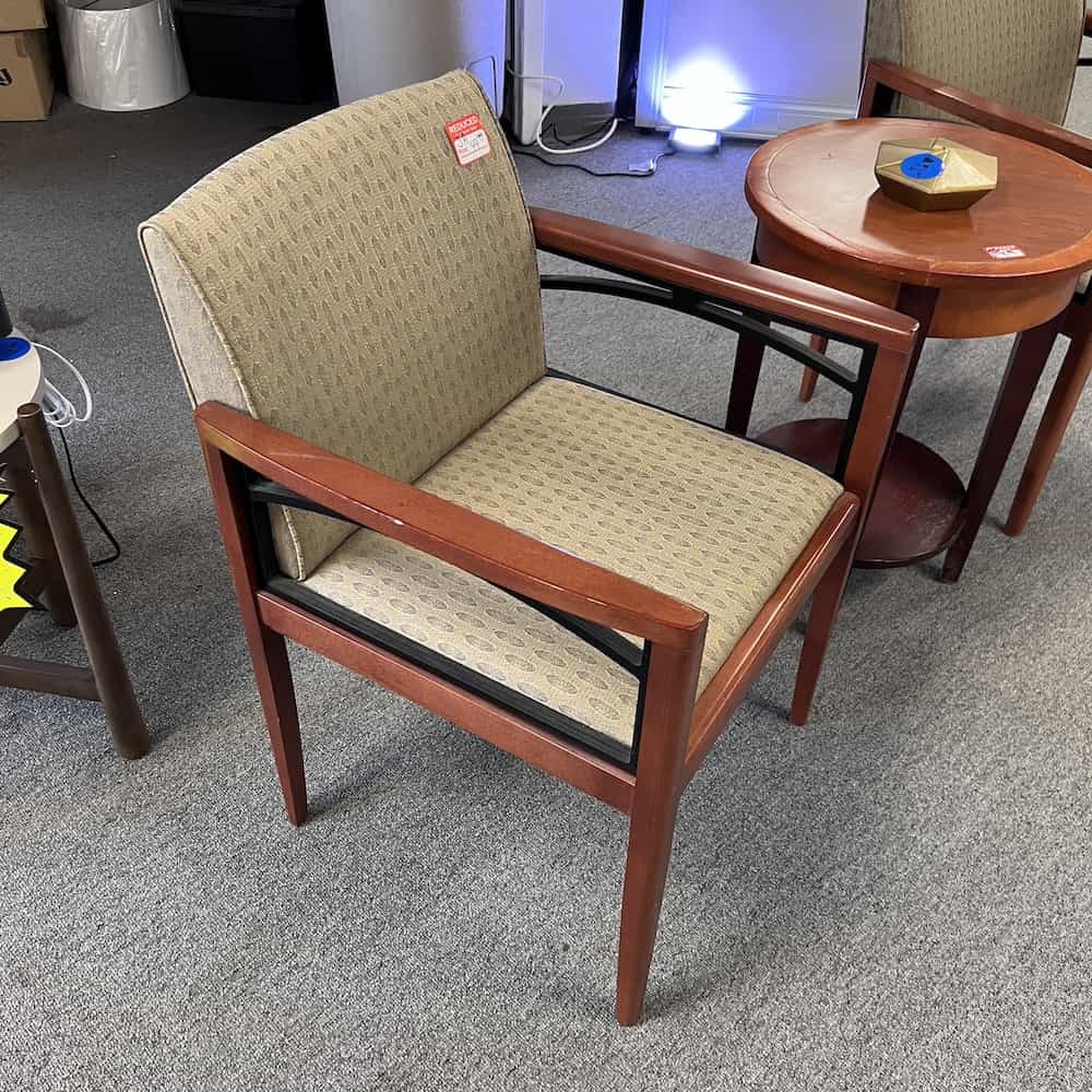 tan upholstery guest chair with cherry veneer steelcase used