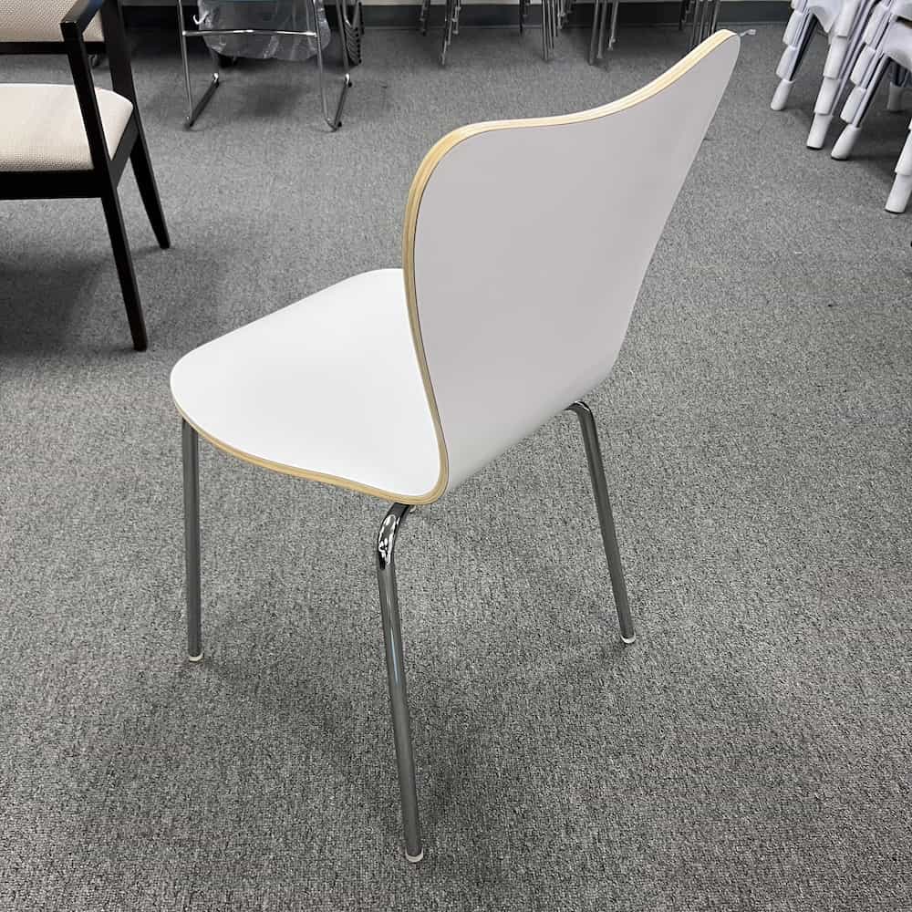white molded wood stacking chair with chrome legs modern