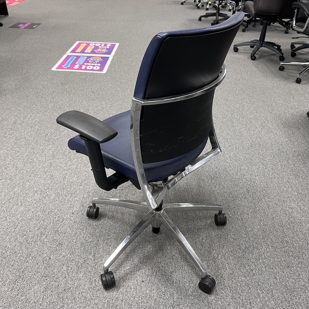 blue vinyl chair with silver base and back accents teknion fitz used