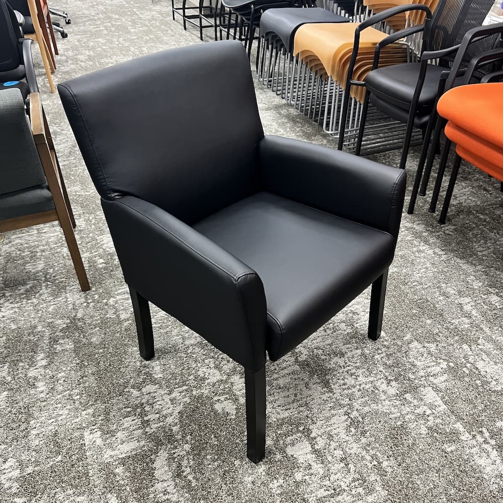 black vinyl guest arm chair