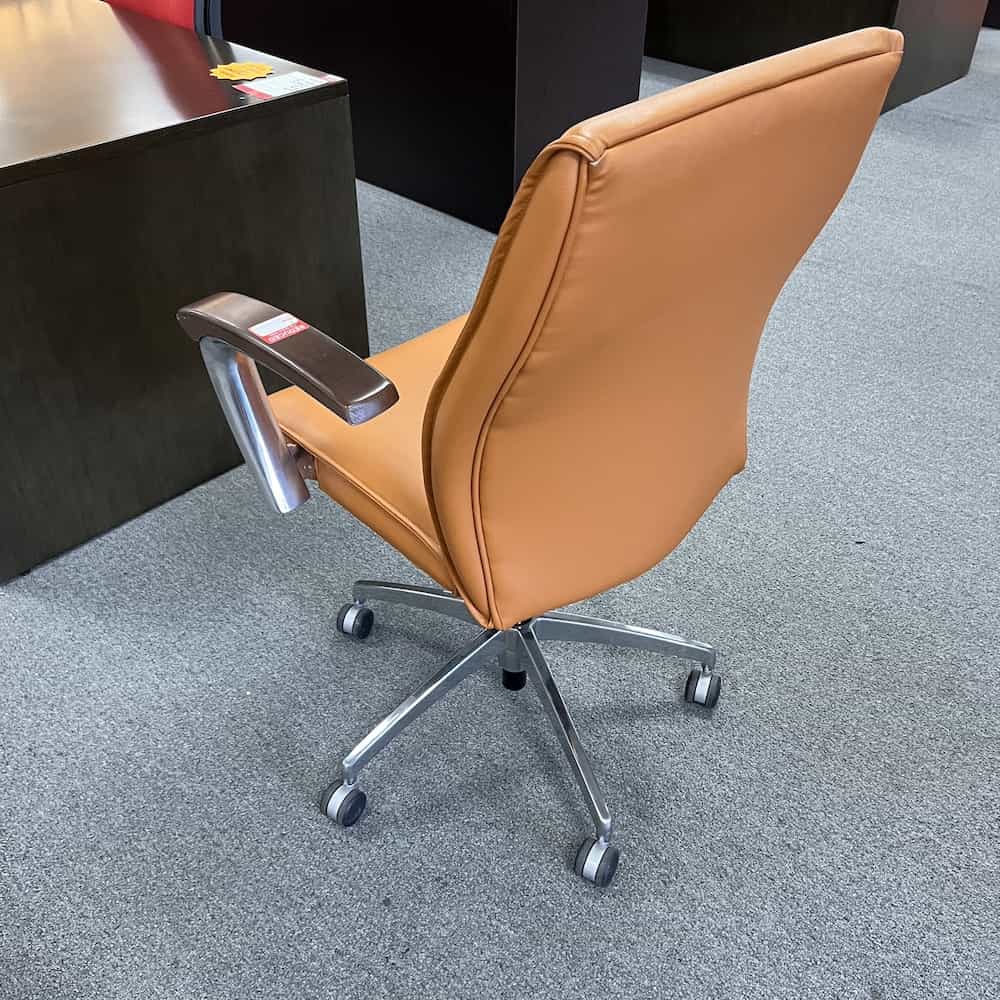 orange vinyl paoli bernhardt task chair with wood arm rests