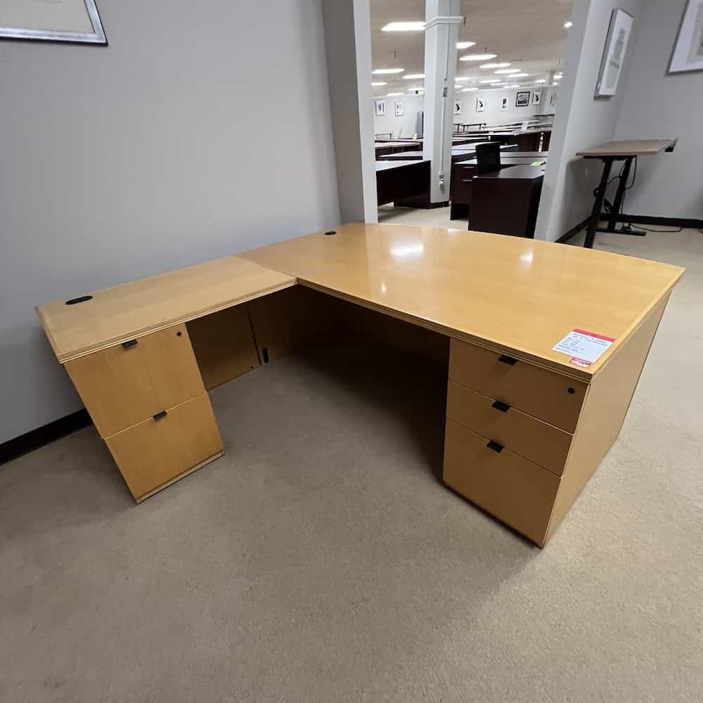 maple veneer l-desk left return bow front used desk gunlocke 72"