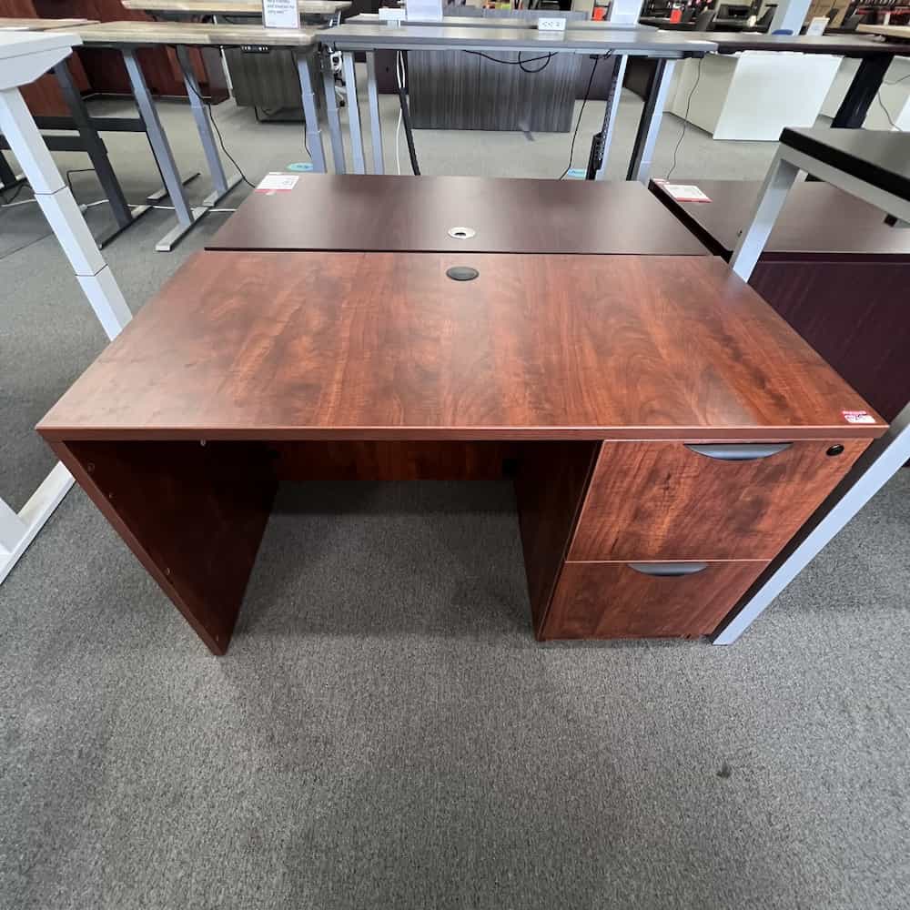 cherry laminate desk with file file and black pulls 48 x 24