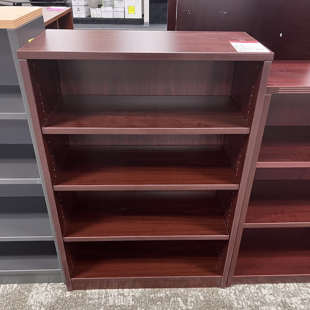 mahogany bookcase 48" tall, laminate, used office furniture
