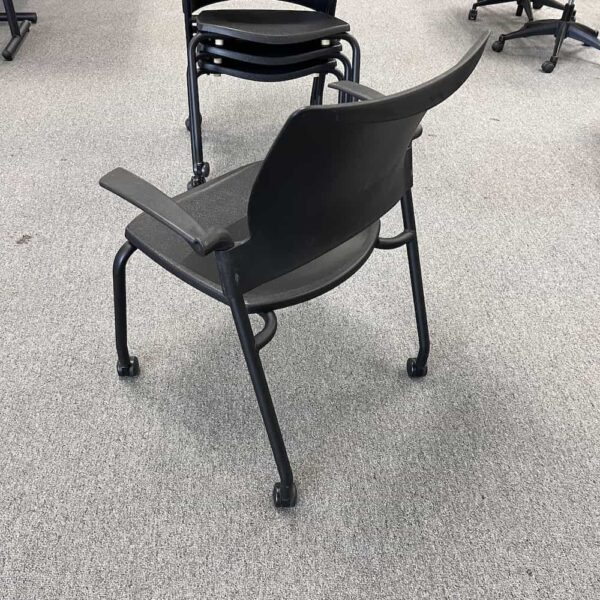 black plastic rolling stacking chair with arms sitonit used
