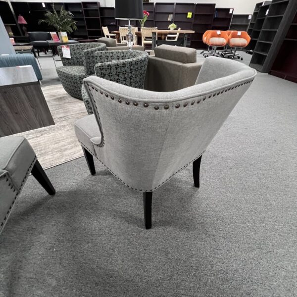 grey upholstered lounge chair