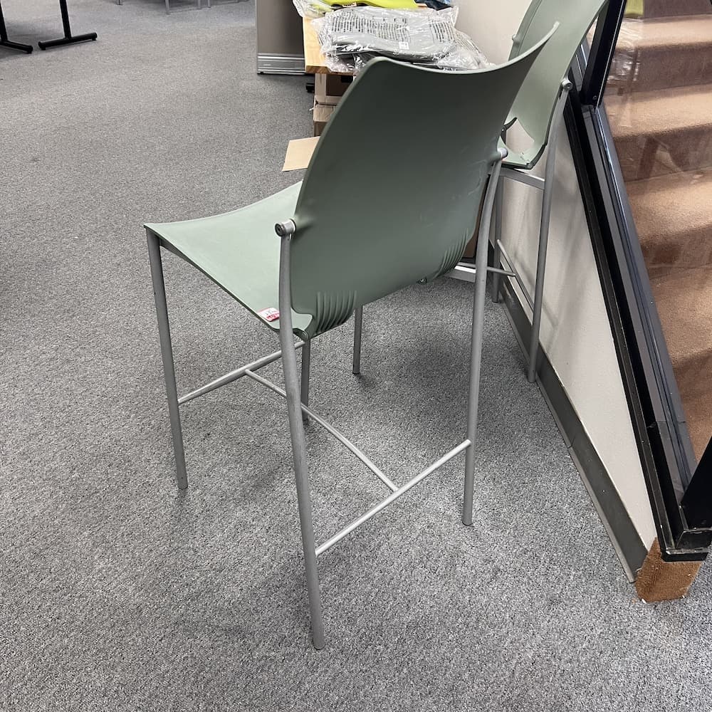 green plastic bar height stool
