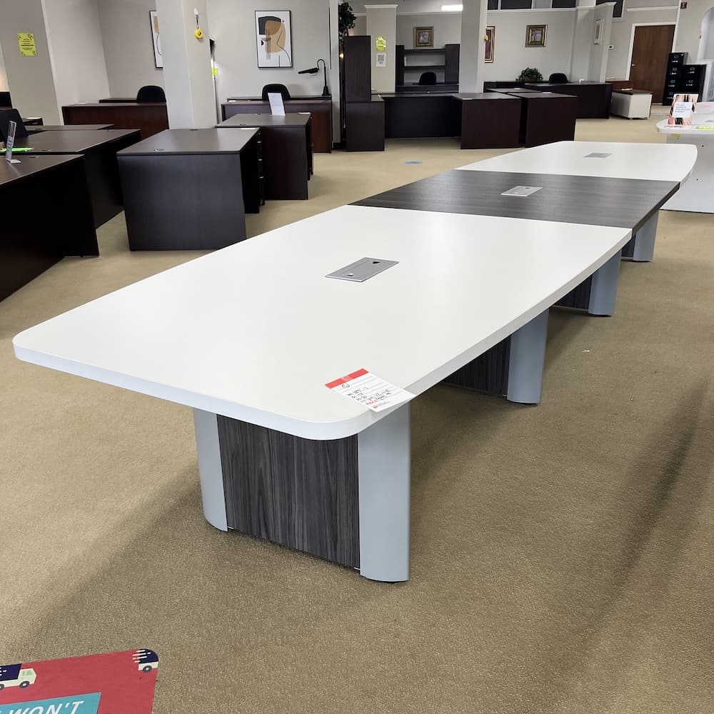 white and grey laminate boat shaped conference table with elliptical base, used office furniture