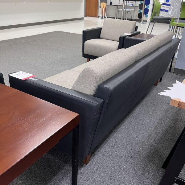 beige heather oatmeal upholstery with navy vinyl sides lounge sofa couch waiting reception used office furniture hon brand