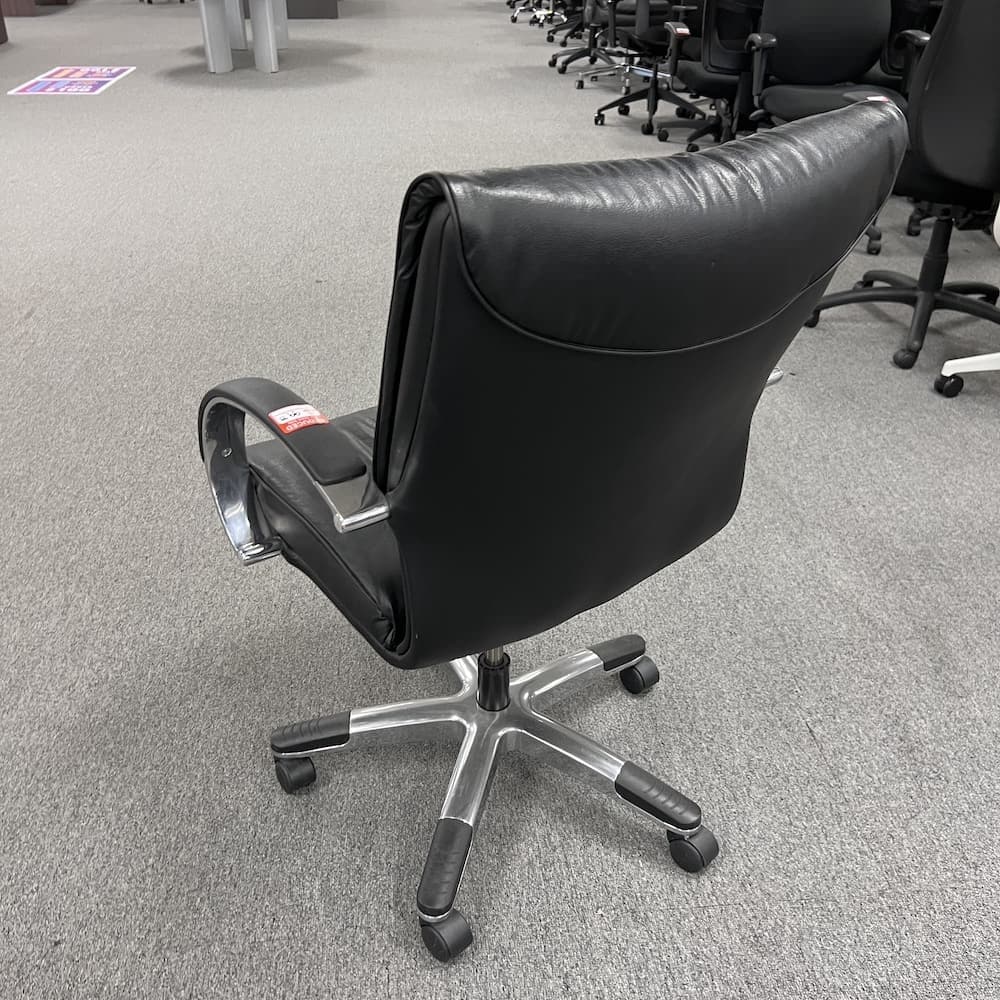 black vinyl neutral posture conference chair used office furniture