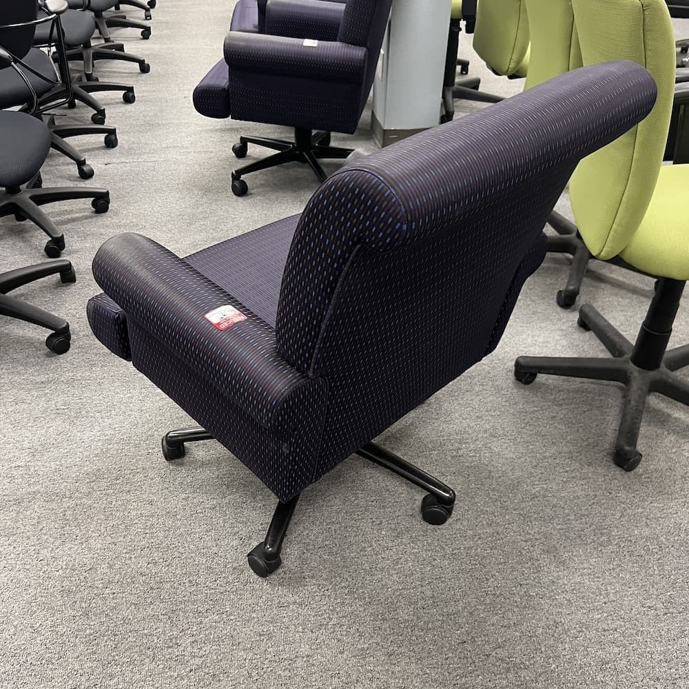 purple upholstered executive chair used office furniture