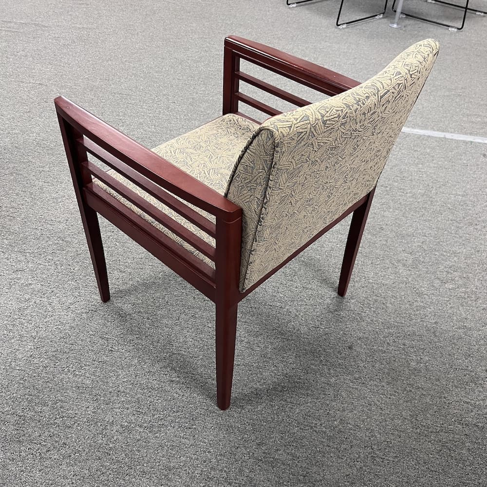 mahogany veneer wood frame with tan and grey upholstered patterned seat and back used office furniture reception seating
