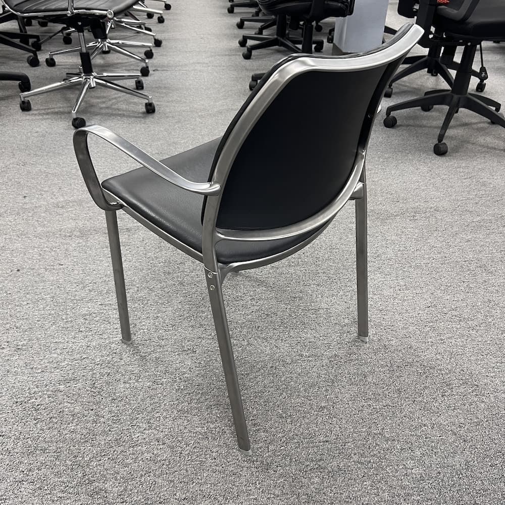 stua gasca stacking chair, black with silver frame, made in Spain, used office furniture, guest seating
