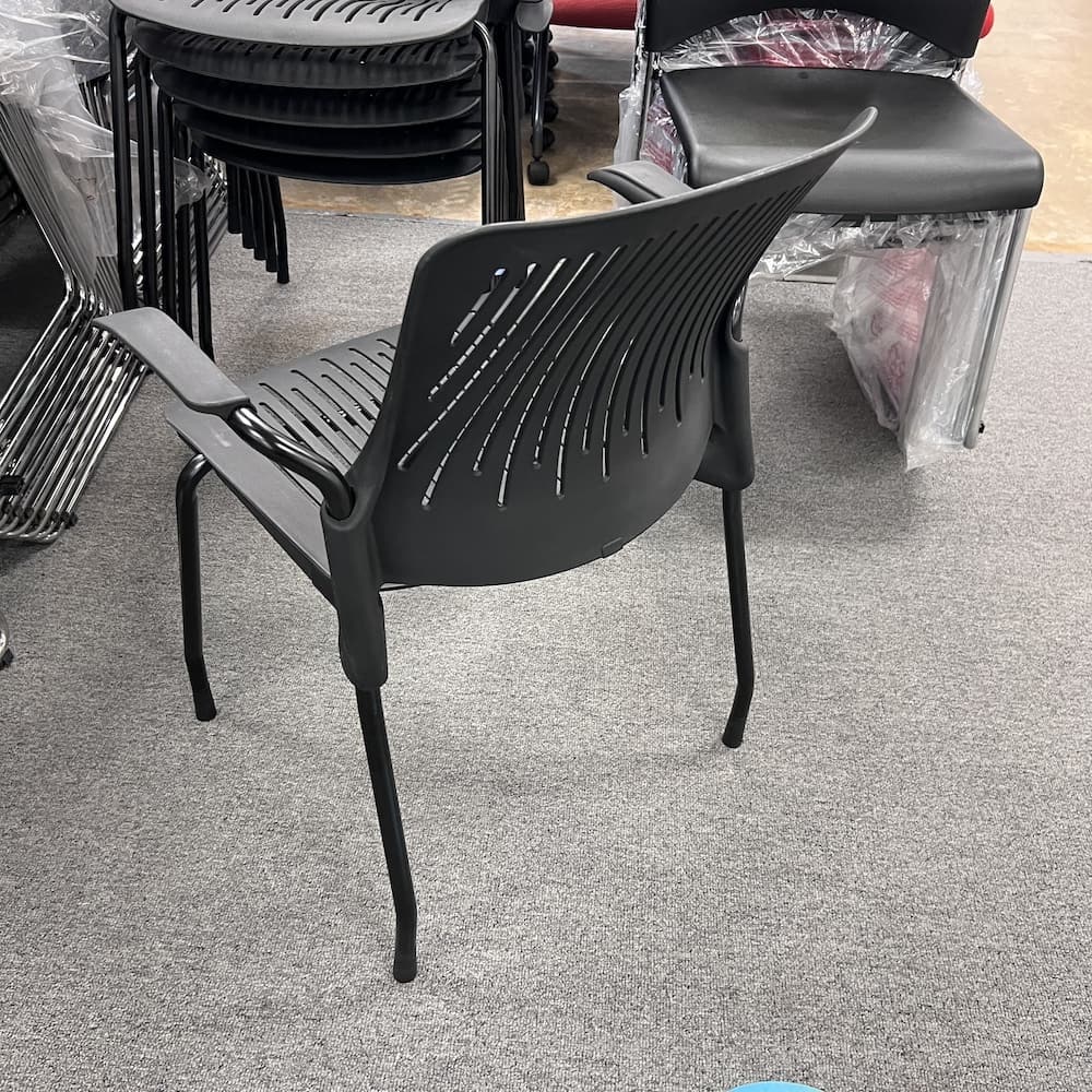 Black plastic arm chair, black legs, stacking, used office furniture