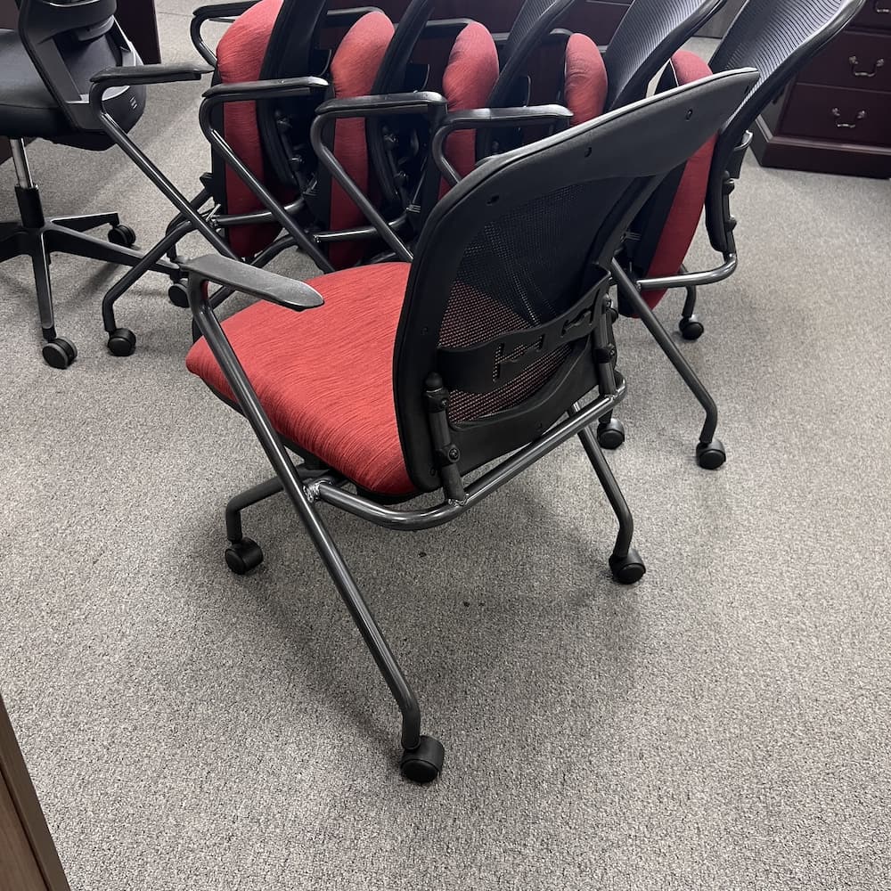 red upholstered seat nesting chair with black mesh back seat, nesting, rolling conference training chair, used office furniture